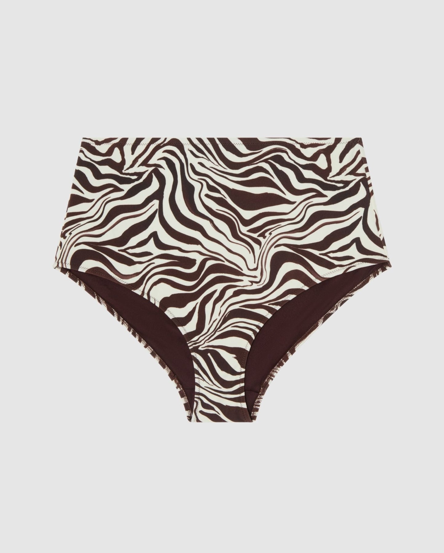 An high-waist bikini bottom in a zebra print.