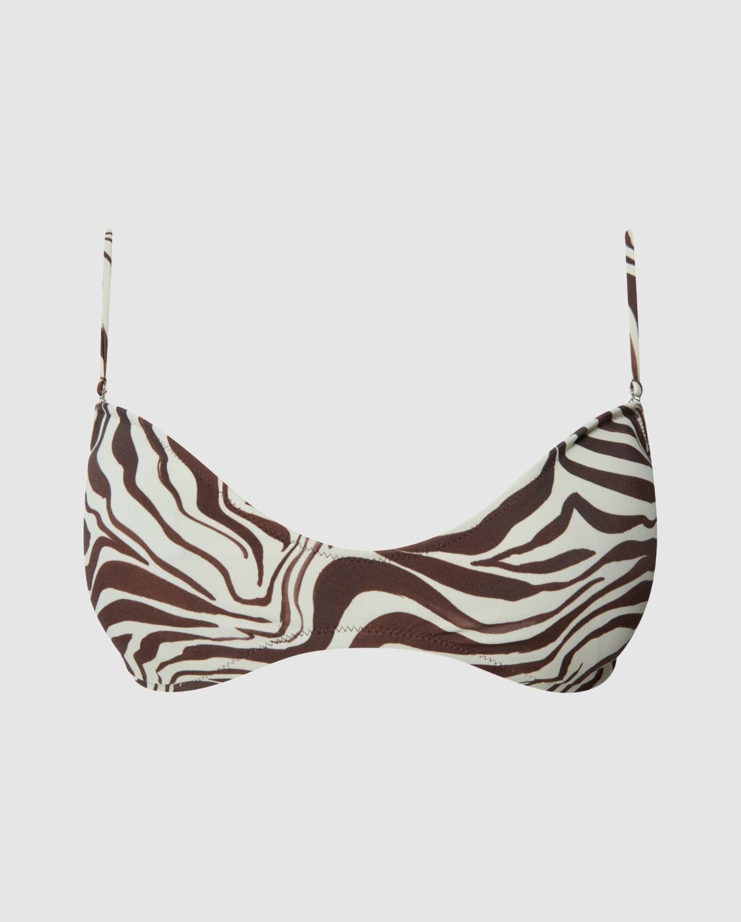 An shaped bikini top in a zebra print.