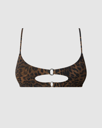 An leopard print bikini top with a cut-out design.