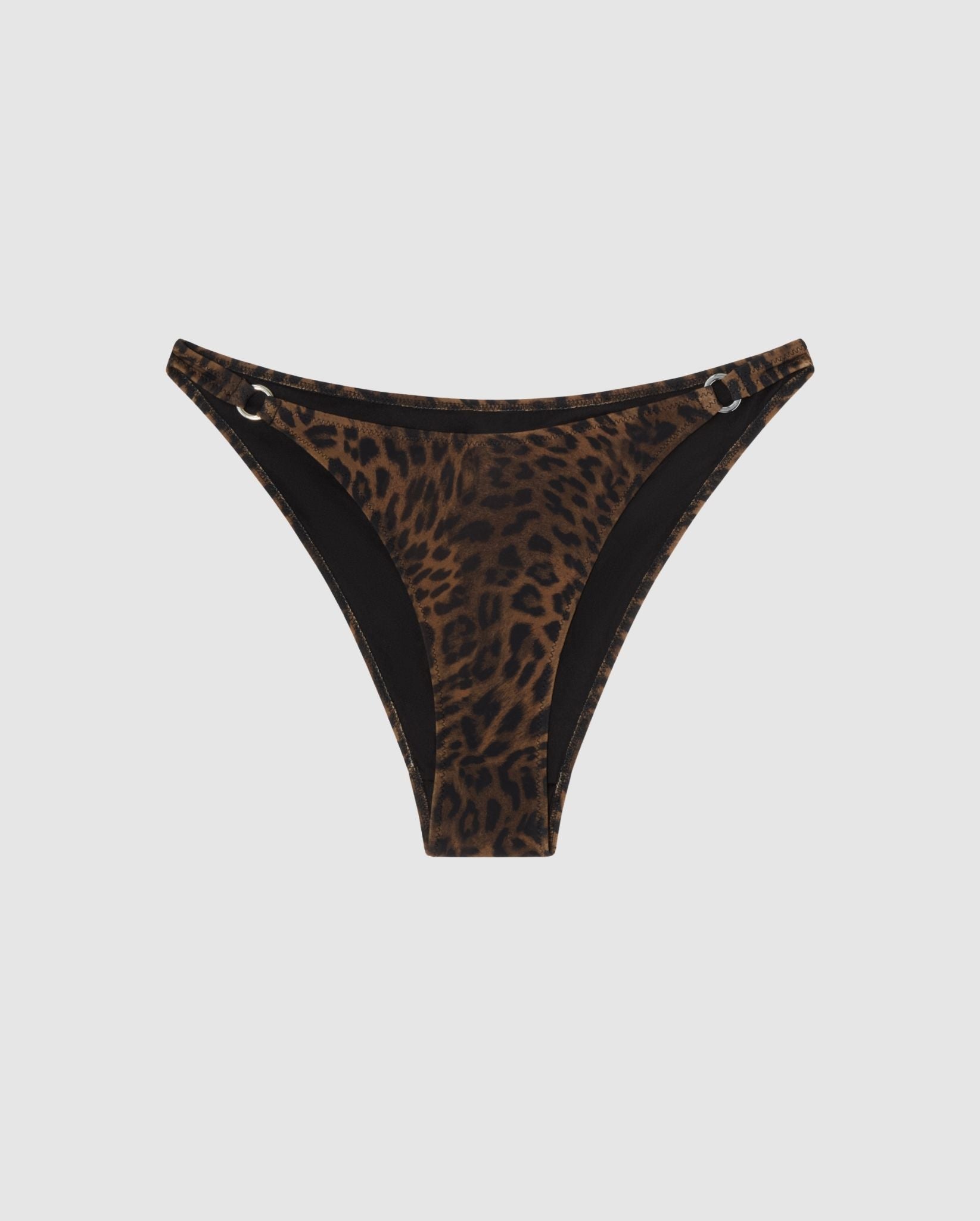 An leopard print bikini bottom with ring accessories.