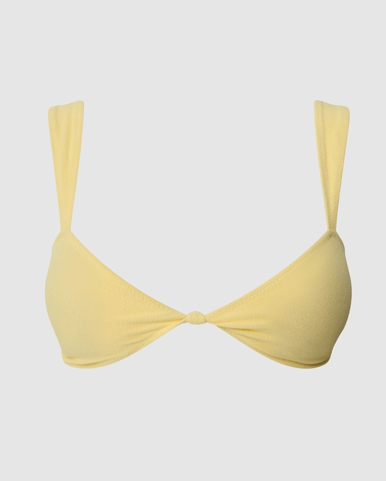 An balconette bikini top in buttery yellow.