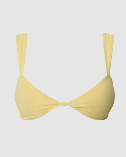 An balconette bikini top in buttery yellow.