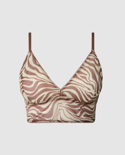 An mesh triangle top in a zebra print.