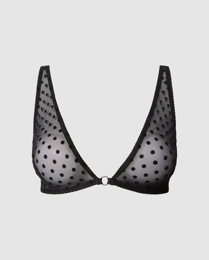 An mesh bralette in an plunge, v-neck design in black dots.
