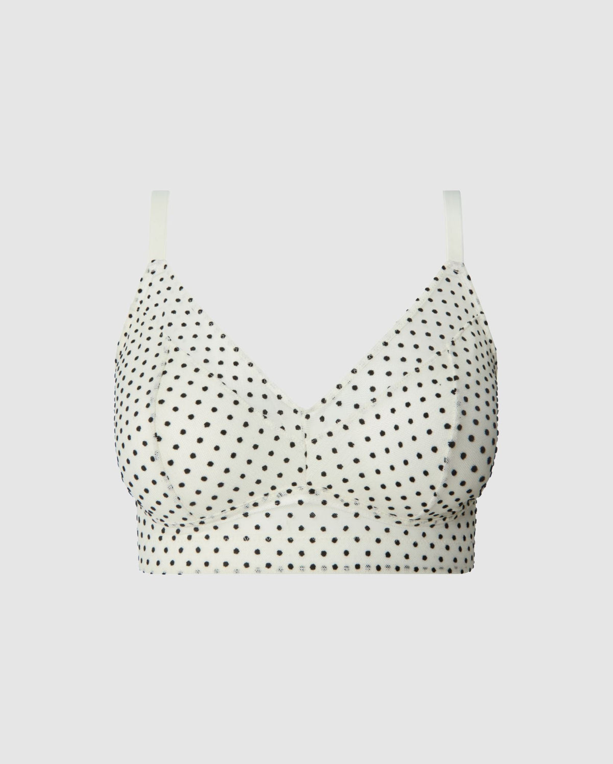 An supportive mesh Bralette in an cream color for larger cups adjustable straps.