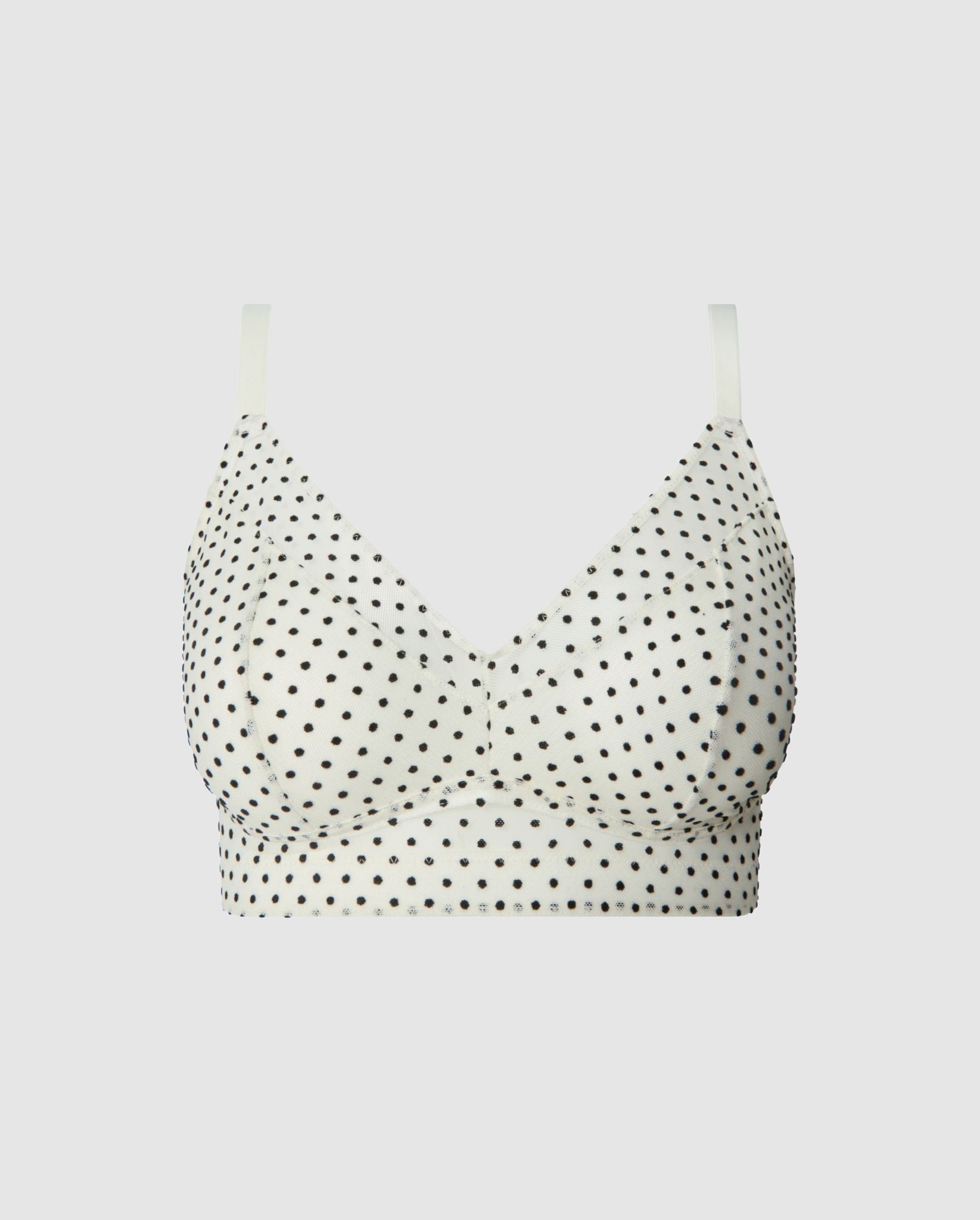 An supportive mesh Bralette in an cream color for larger cups adjustable straps.