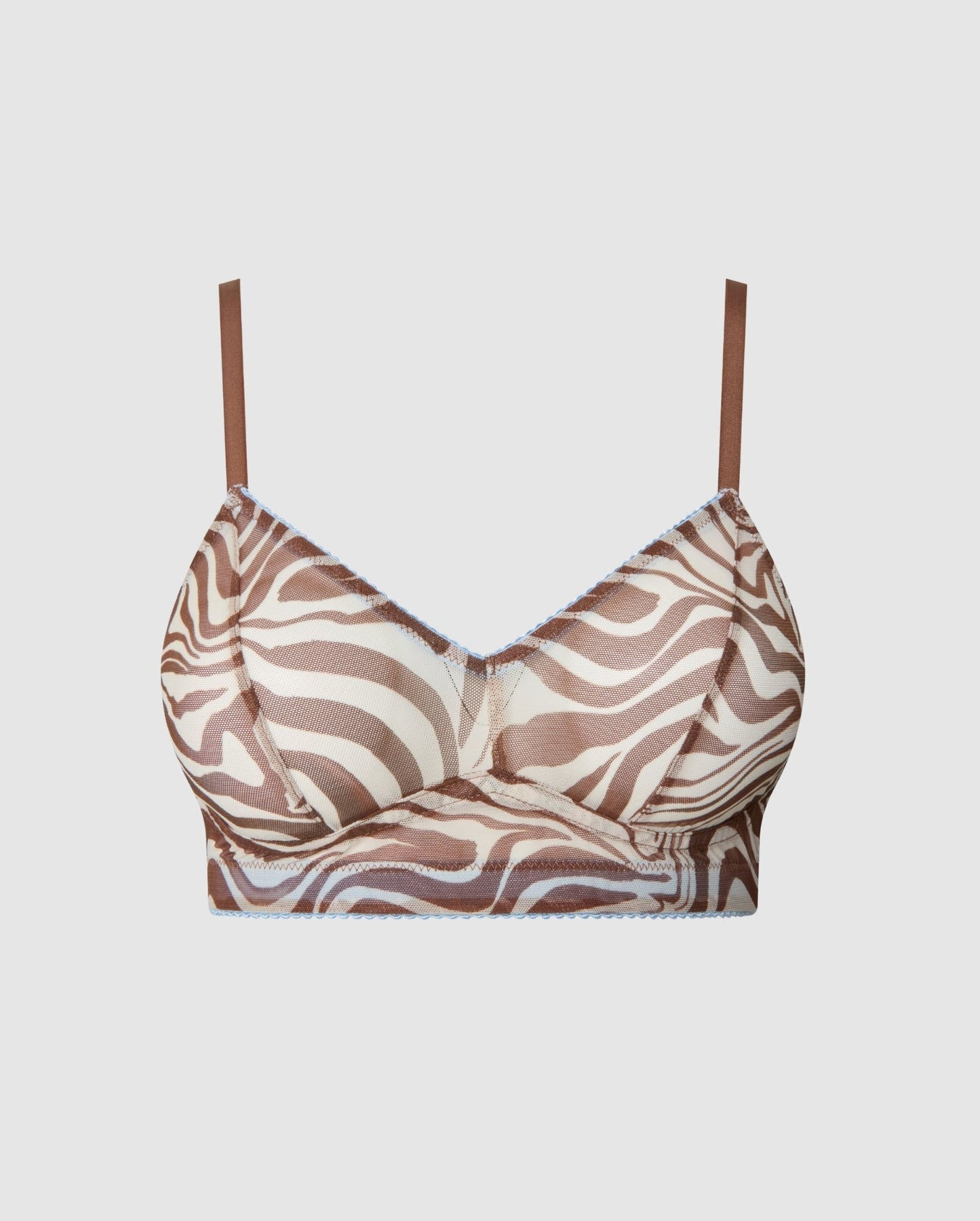 An Mesh balconette with a Zebra print.