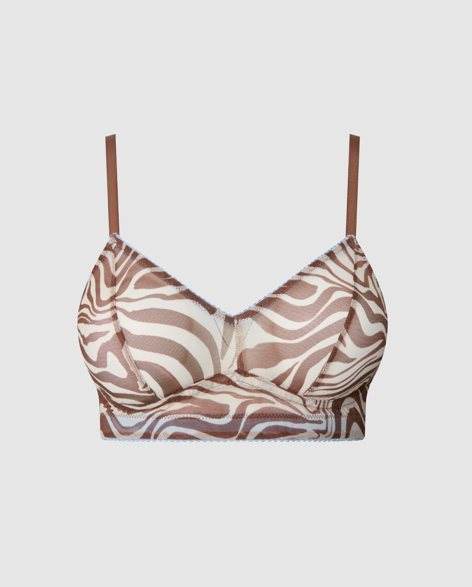 An Mesh balconette with a Zebra print.