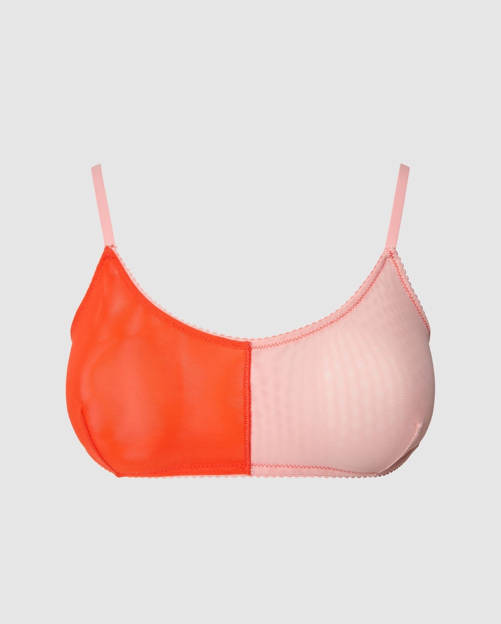 An mesh scoop bralette in an red and rose split design.