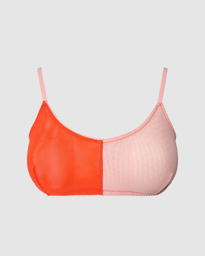 An mesh scoop bralette in an red and rose split design.