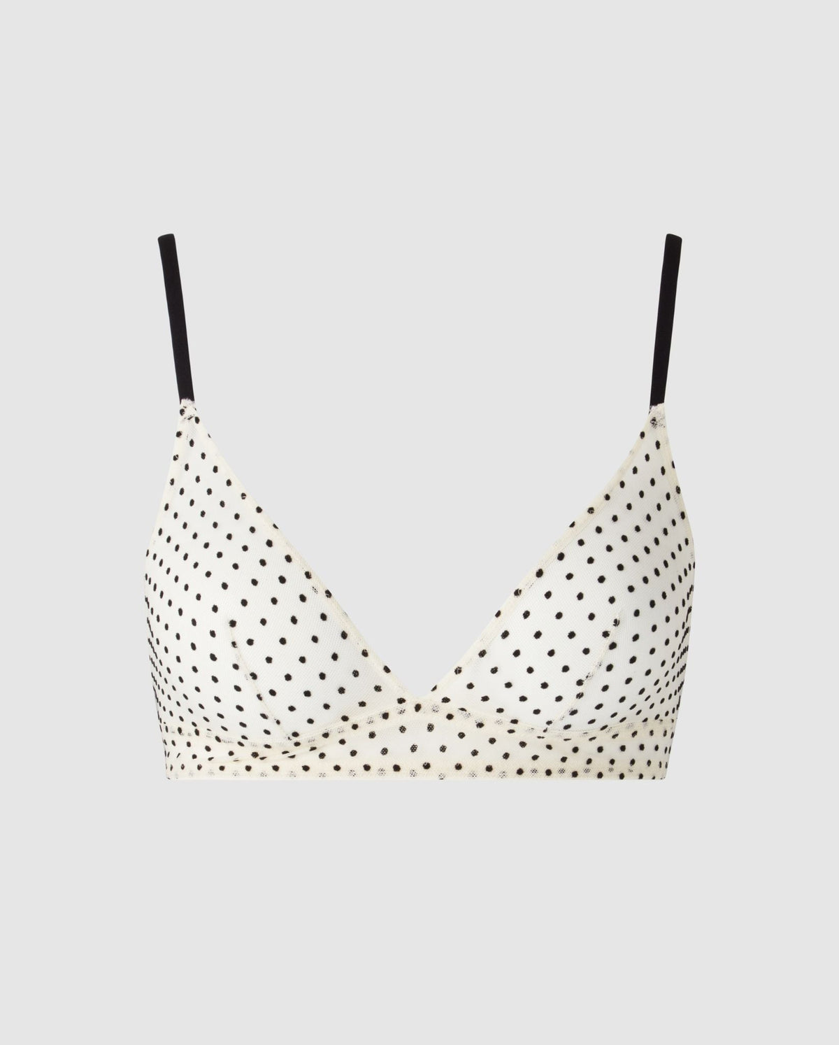 An cream and black, triangle shaped bralette in mesh.