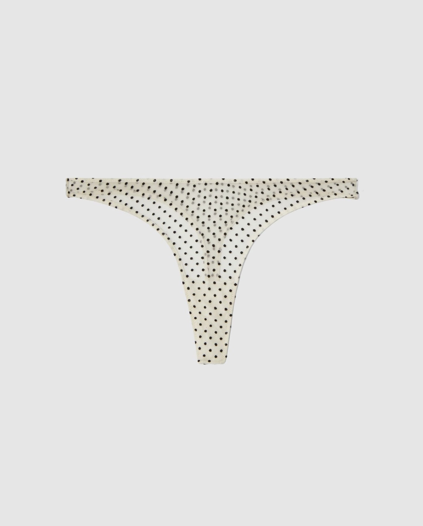An Mesh mid rise high cut design in a cream and black dots color. 