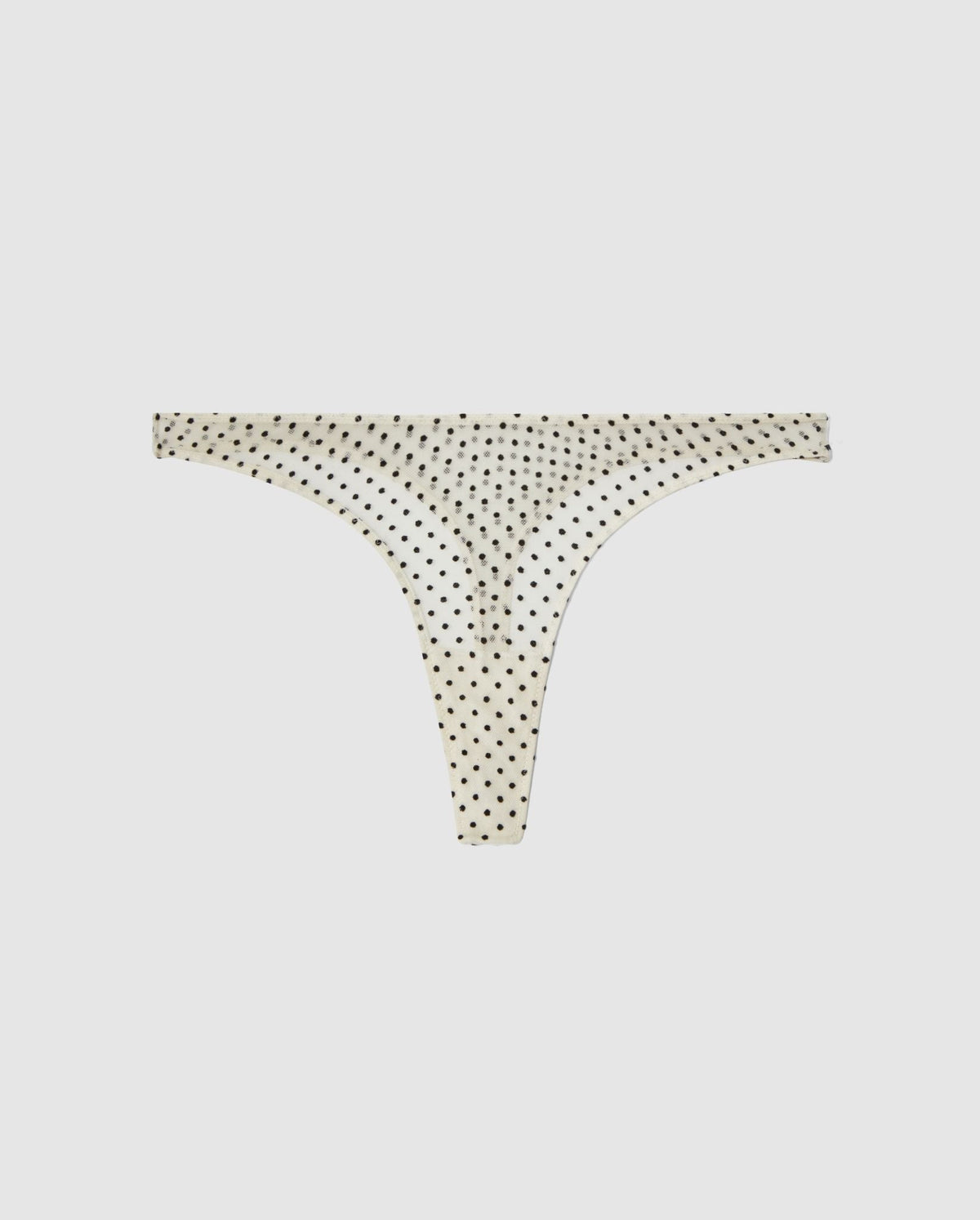 An Mesh mid rise high cut design in a cream and black dots color. 