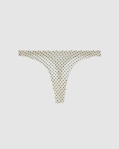 An Mesh mid rise high cut design in a cream and black dots color. 