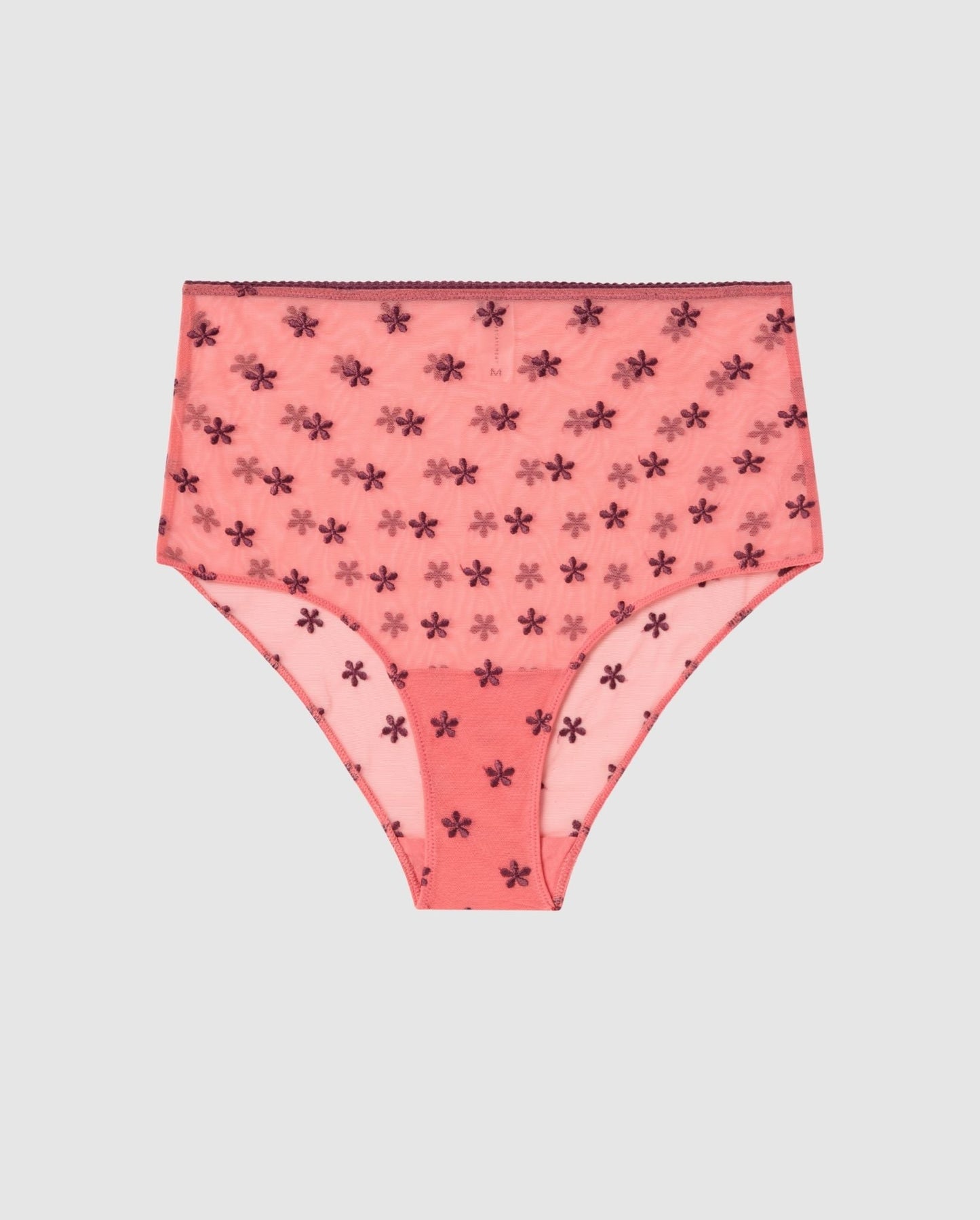 An highwaist brief in coral mesh with cherry flower accessories.
