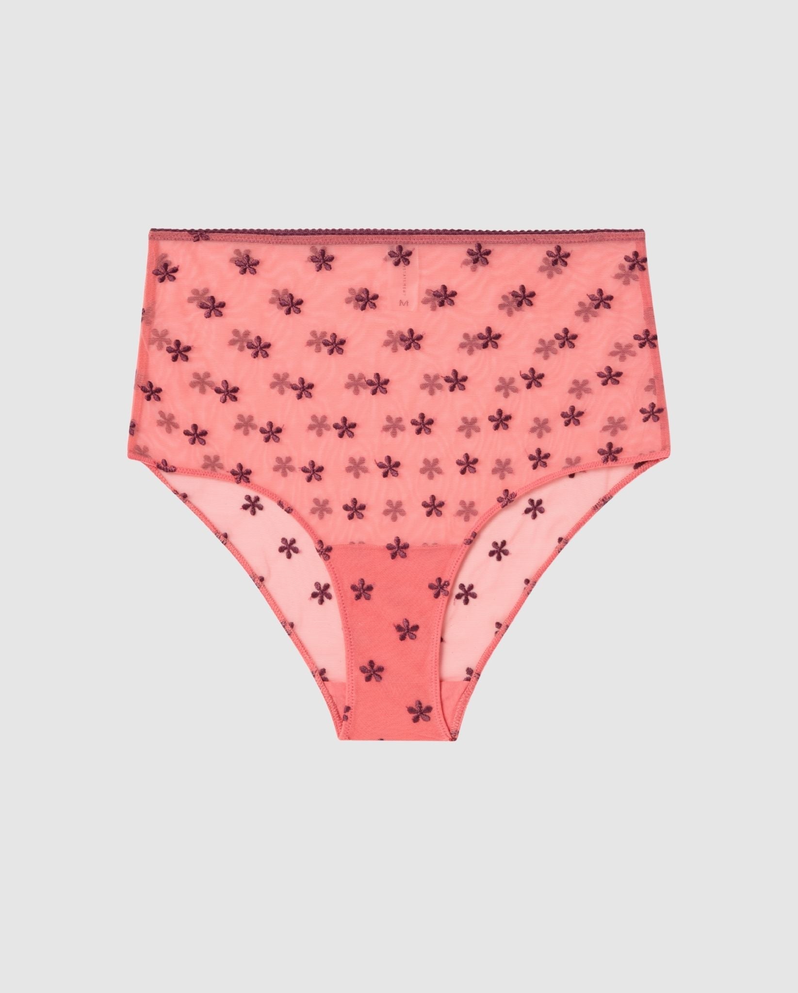 An highwaist brief in coral mesh with cherry flower accessories.