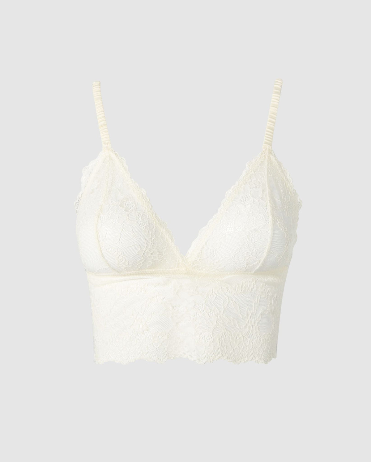 An lace bralette top in cream.