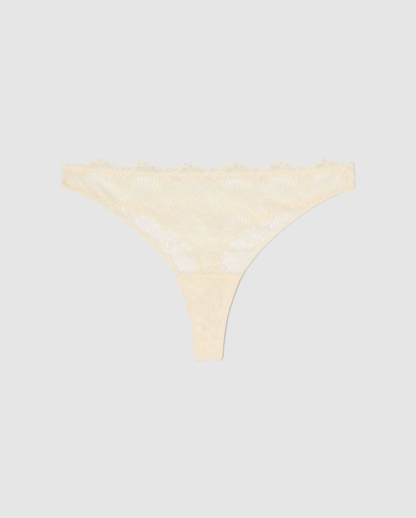 An Lace mid rise high cut design in a cream color. 