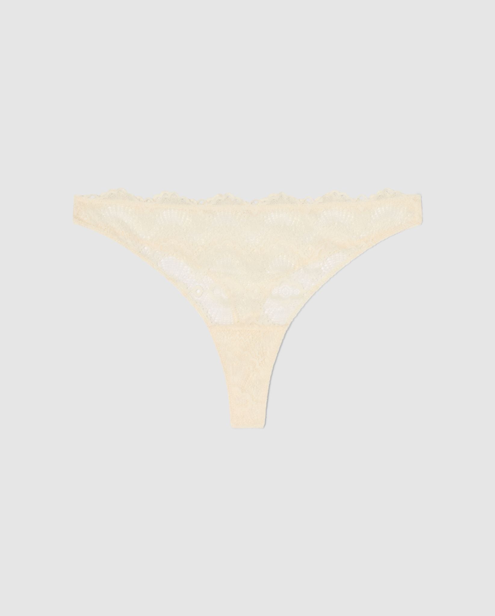 An Lace mid rise high cut design in a cream color. 