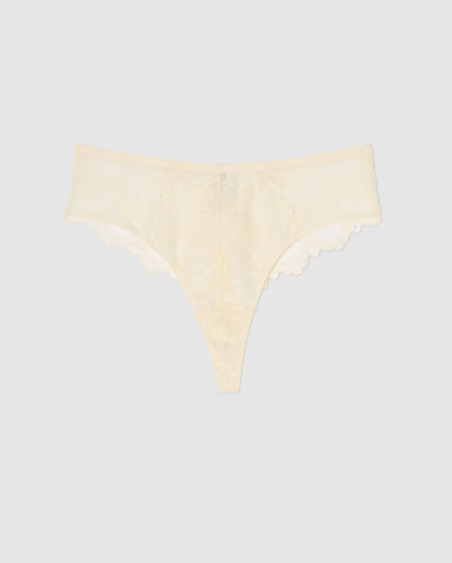An mesh highwaist high cut pantie in cream with lace accessories.