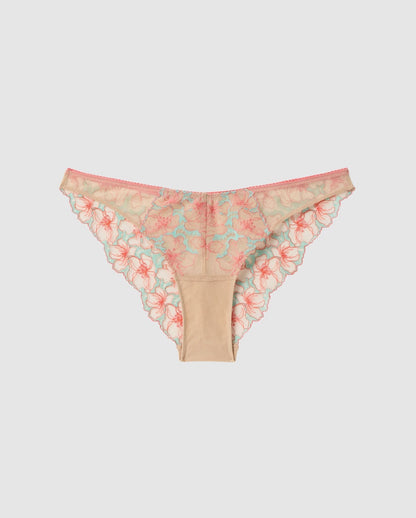 An bikini brief in a beige, pink and blue floral mesh.