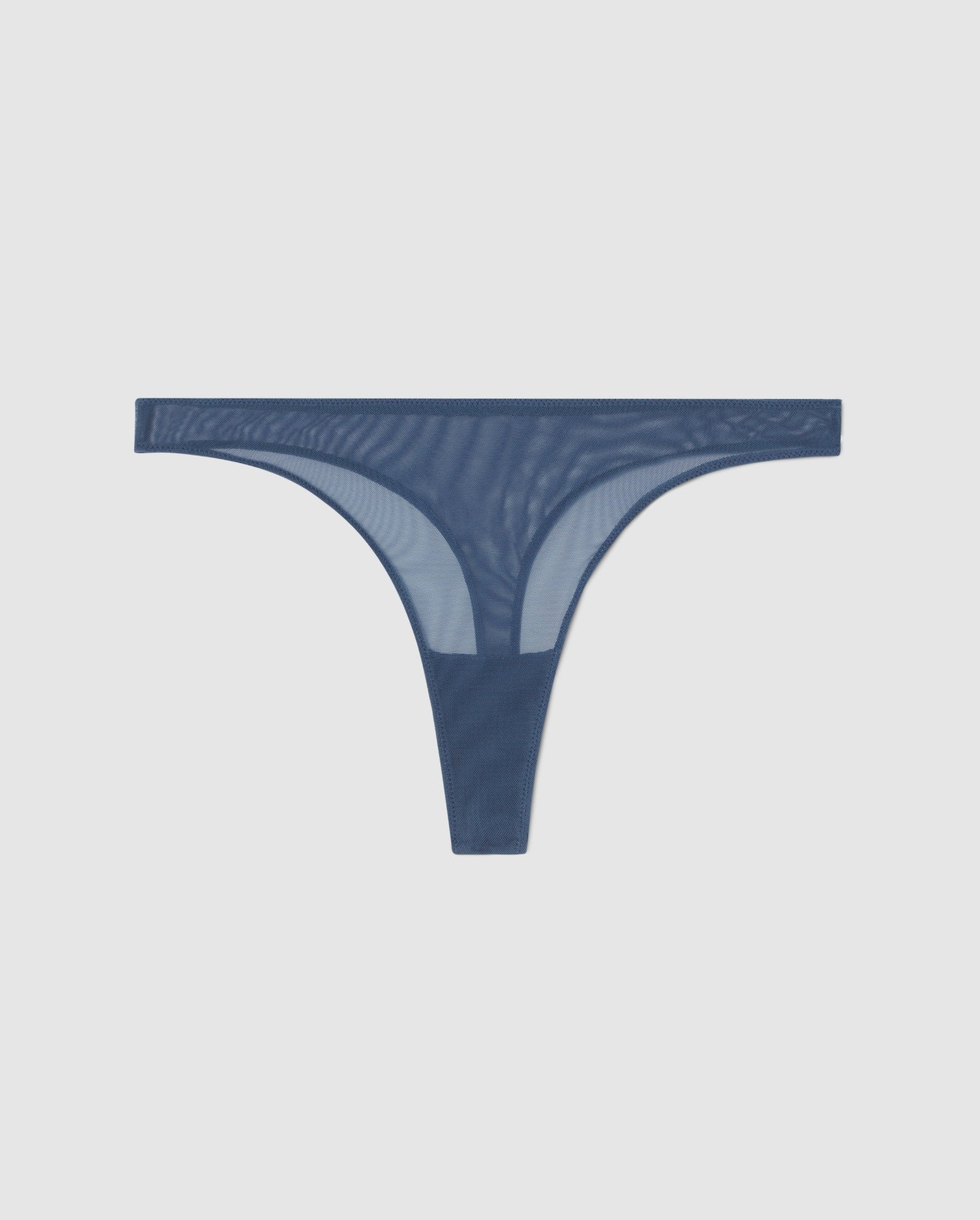 An mid rise high cut panty in faded blue mesh.