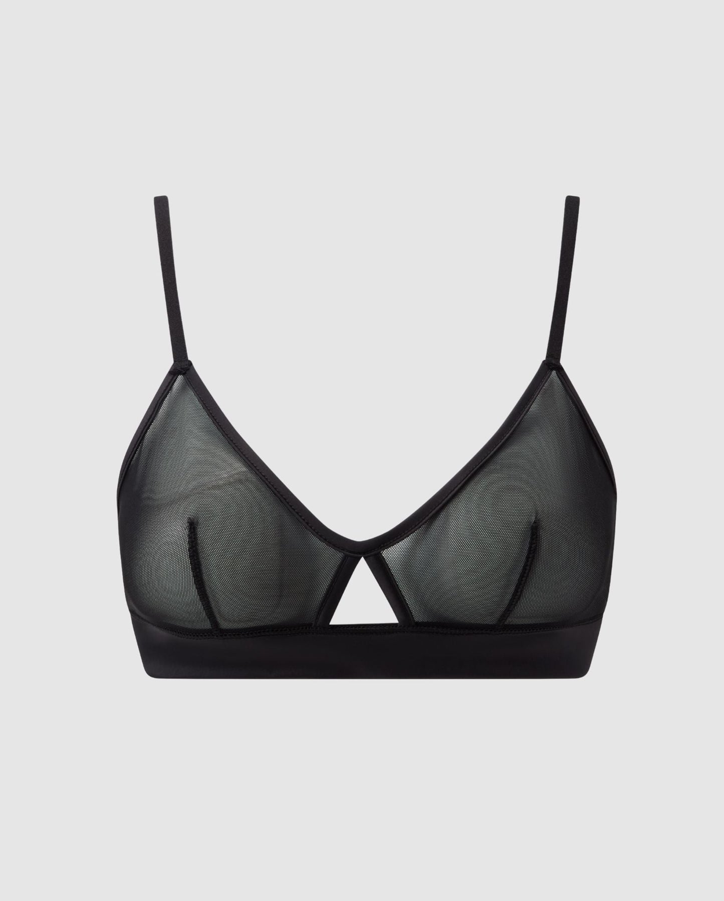An black, triangle shaped bralette in mesh with an cut-out design.