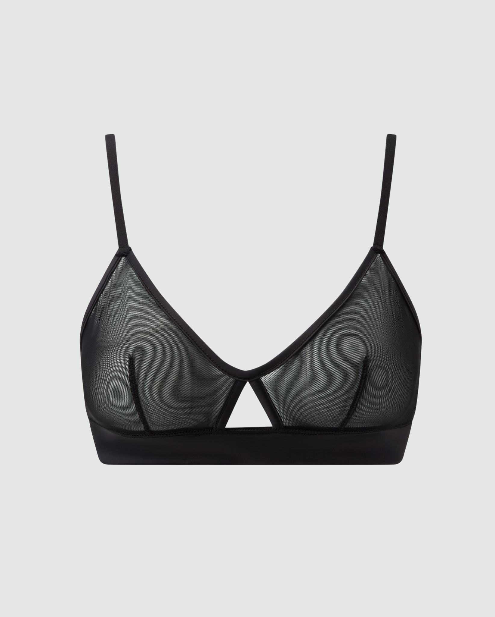 An black, triangle shaped bralette in mesh with an cut-out design.