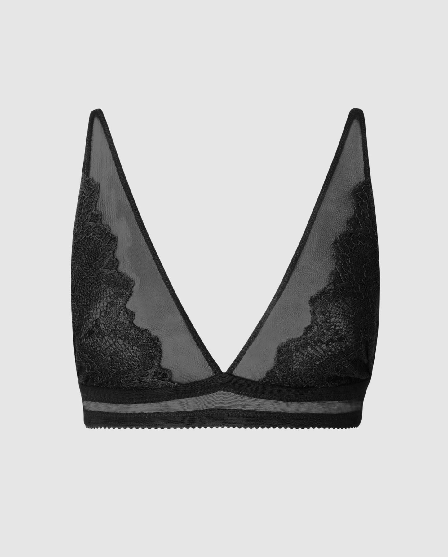 An lace plunge bralette in black with mesh accessories. 