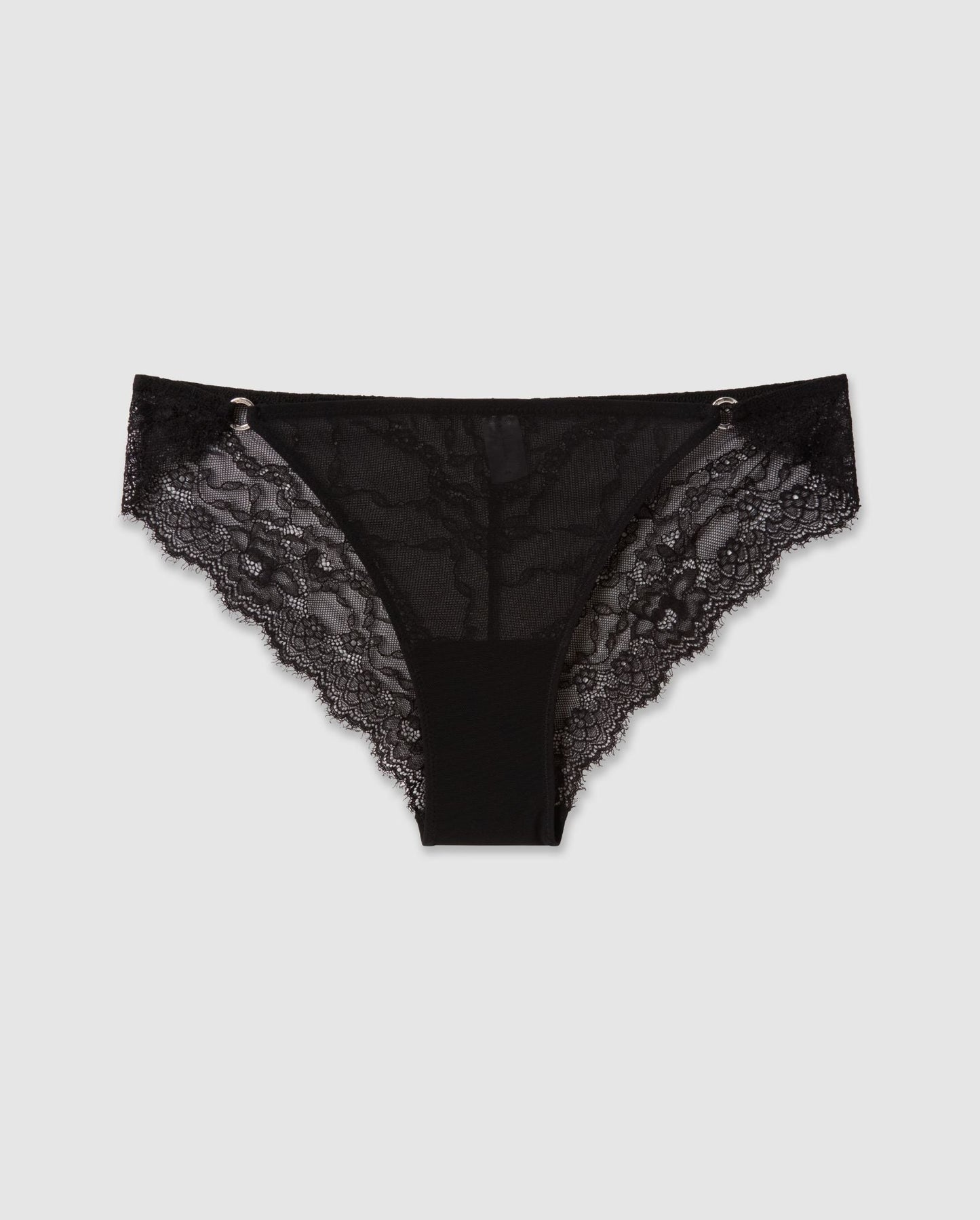 An lace and mesh tanga brief in black with silver accessories.