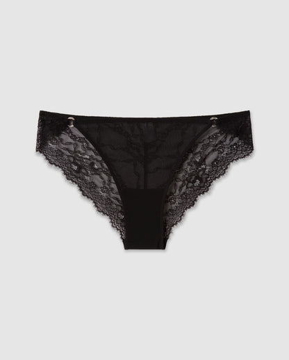 An lace and mesh tanga brief in black with silver accessories.