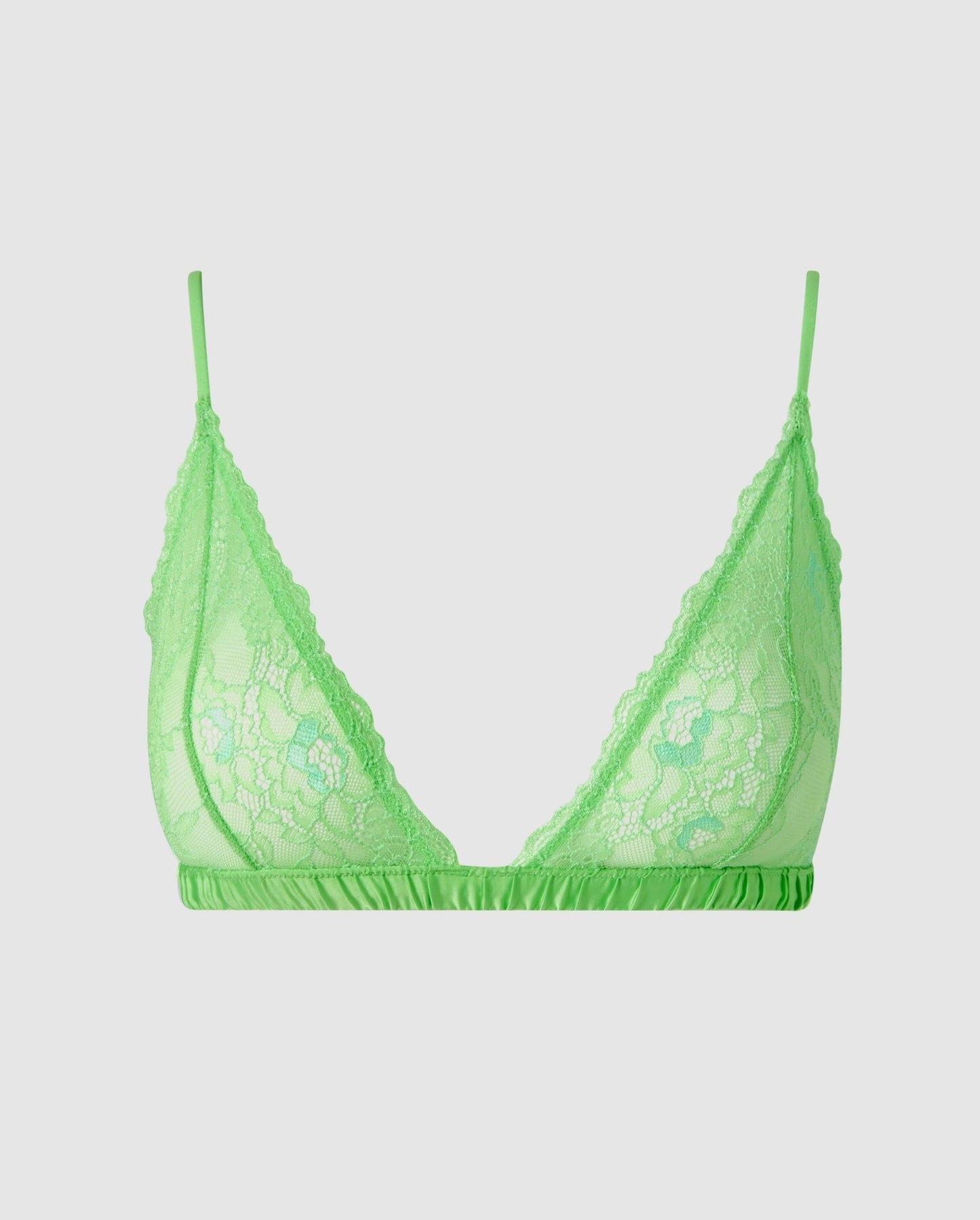 An lace triangle bralette in mint green with satin accessories.
