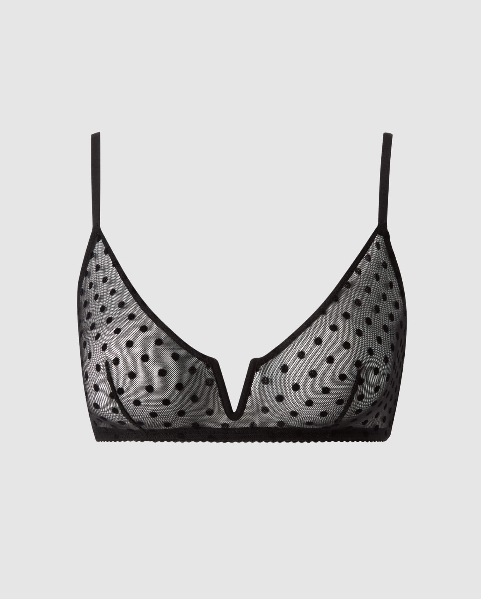 Wire-free black mesh balconette with a V-shaped front design and subtle dotted pattern, featuring structured cups and elegant detailing in classic black.