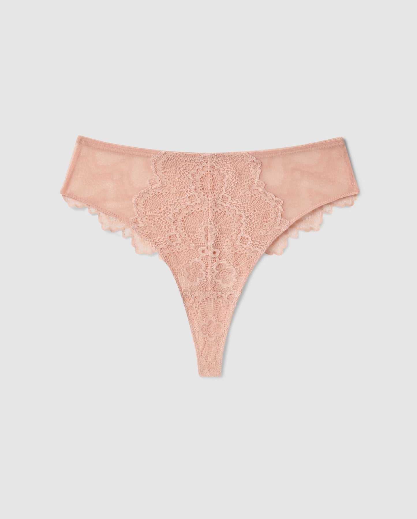 An mesh highwaist high cut panty in beige with lace accessories.