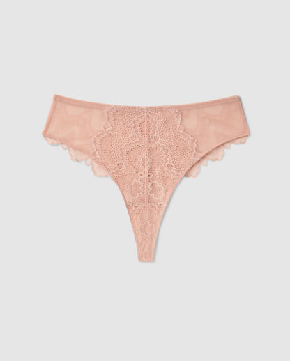 An mesh highwaist high cut panty in beige with lace accessories.