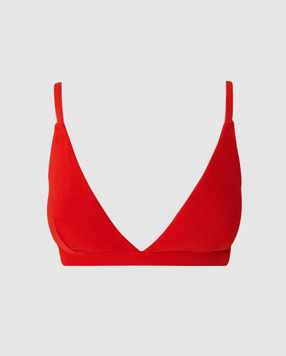 An triangle bikini top in papaya red.