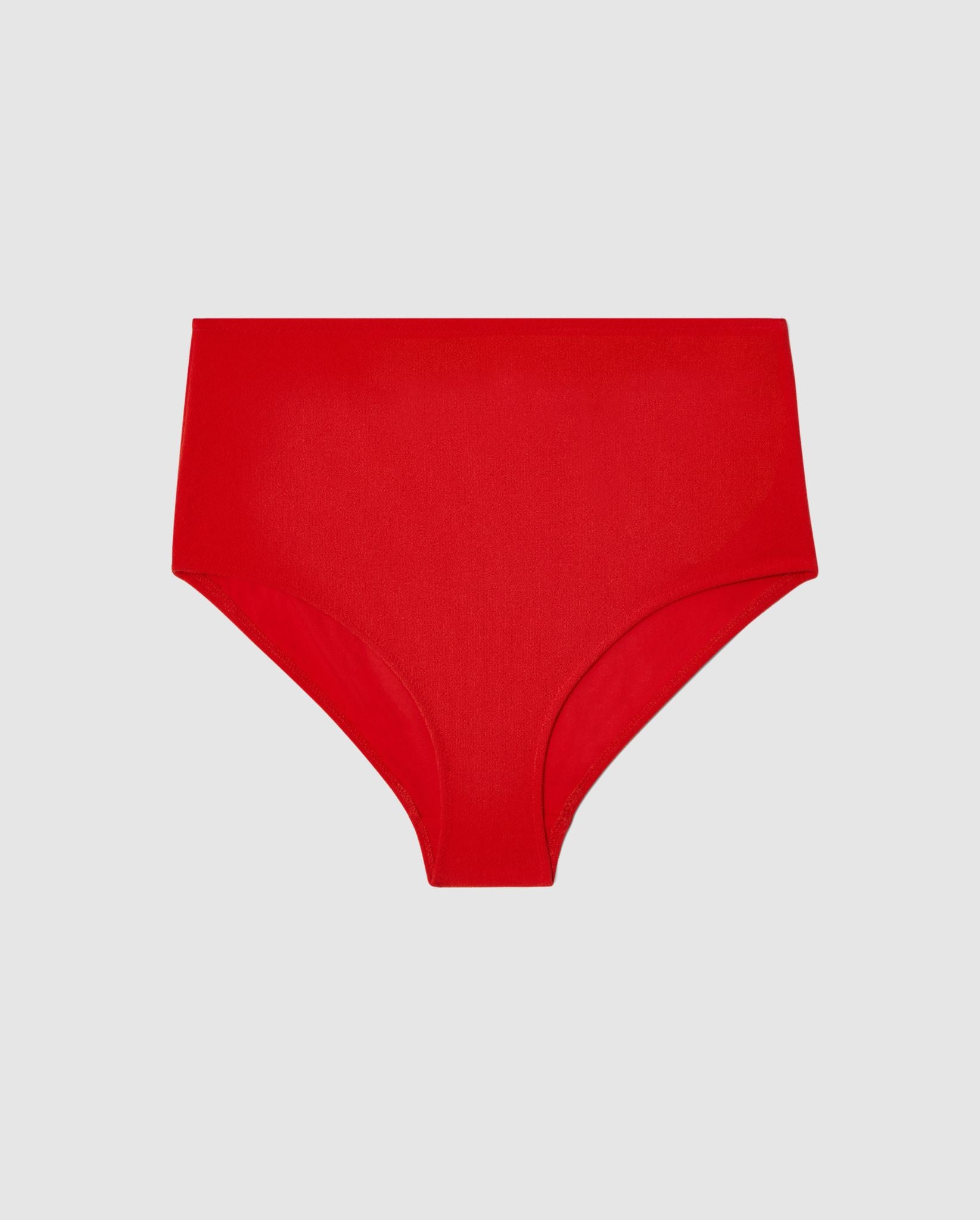 An high-waist bikini bottom in papaya red.