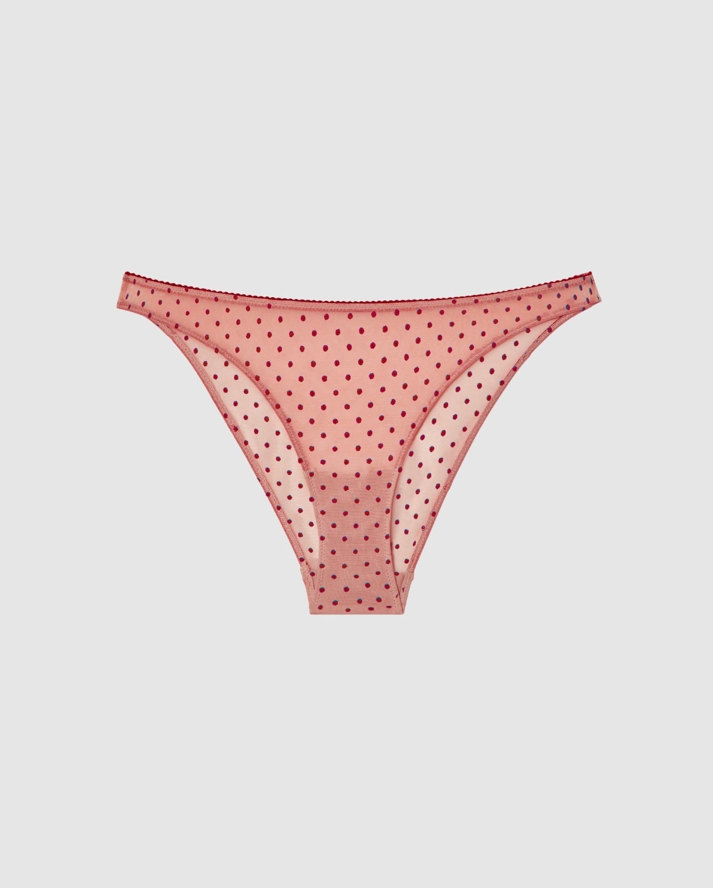 An mesh bikini brief in powder pink with burgundy dots.