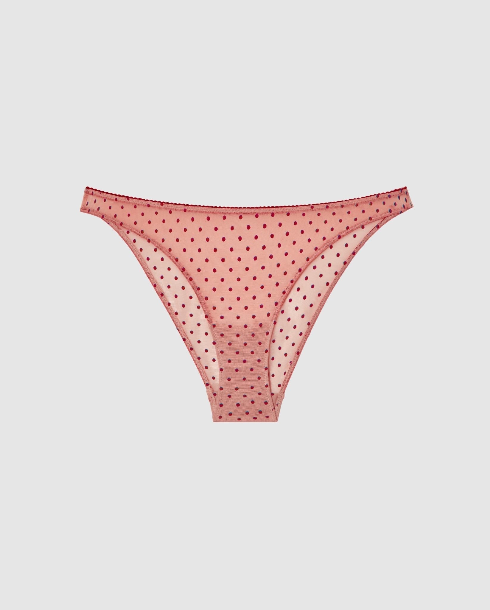 An mesh bikini brief in powder pink with burgundy dots.