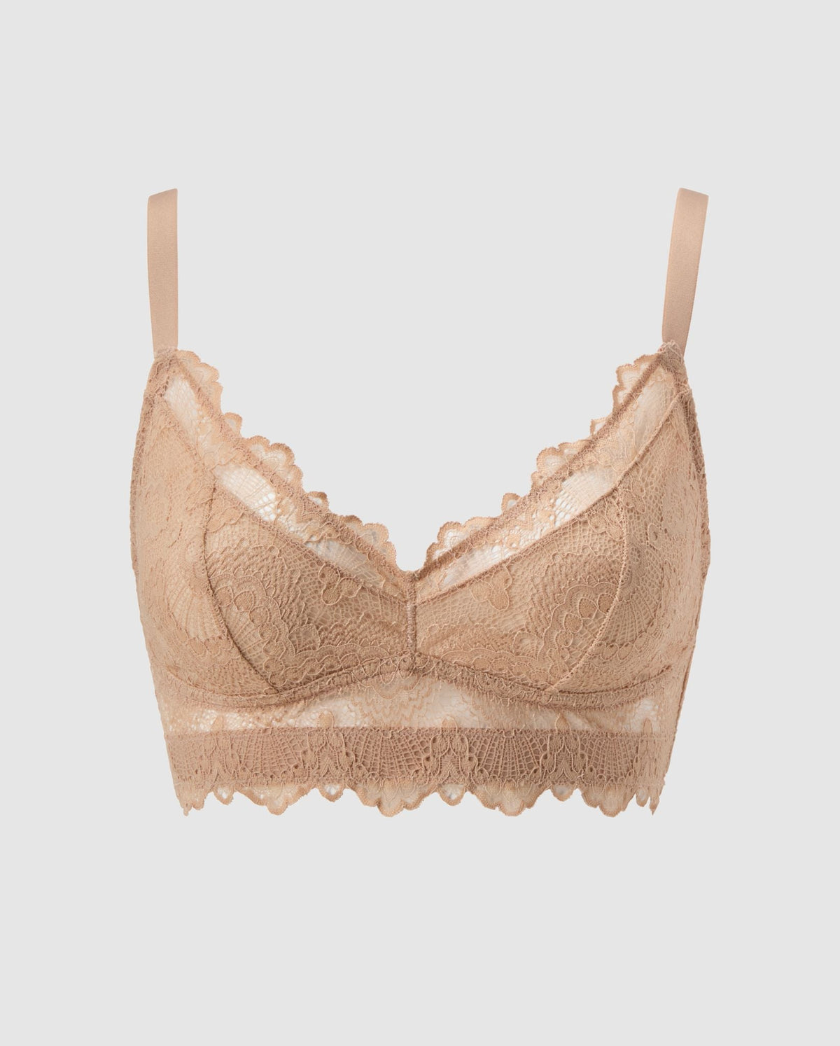 An supportive lace Bralette in an warm beige color for larger cups with extra coverage and adjustable straps for comfort and support.