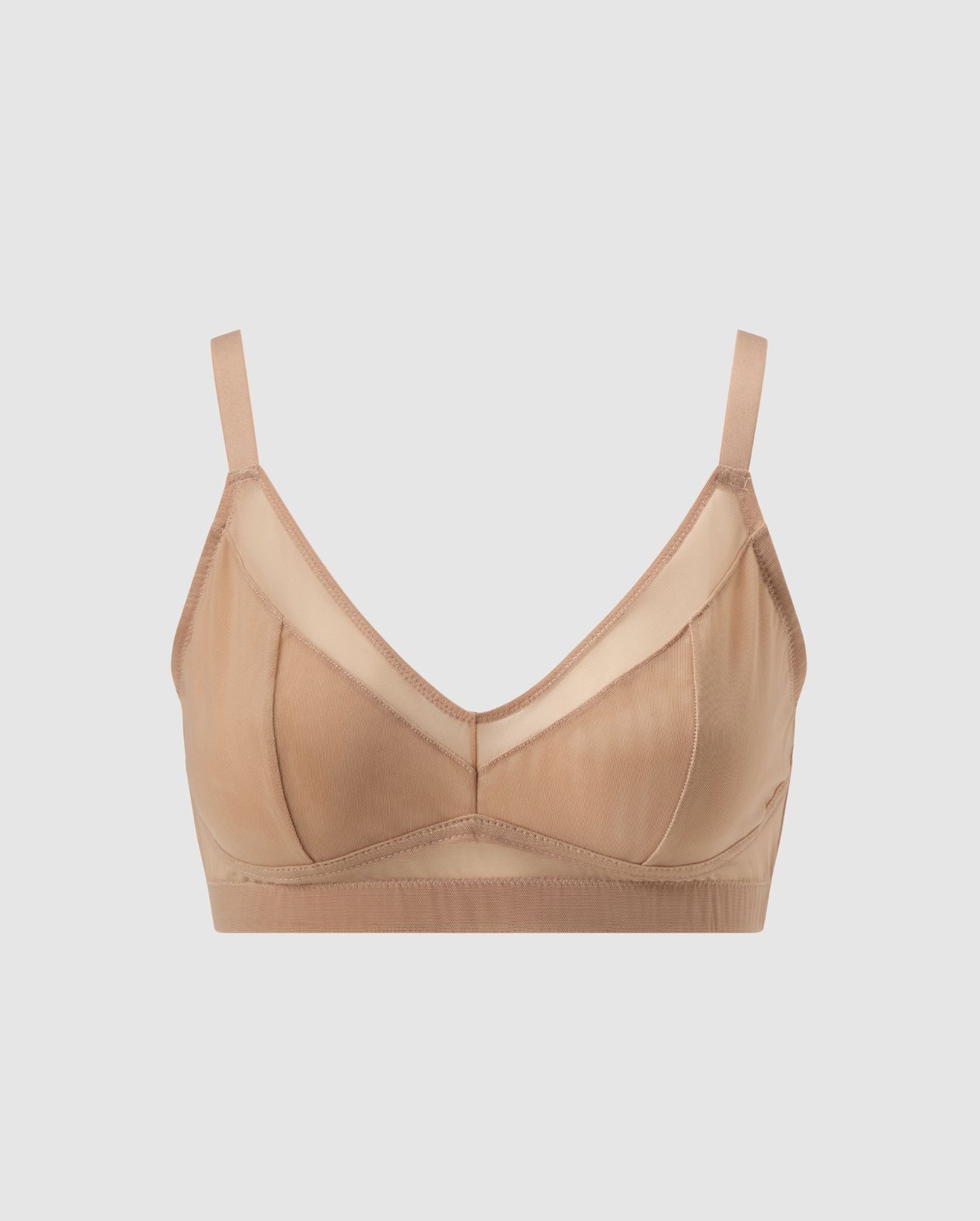 An supportive mesh Bralette in an warm beige color for larger cups with extra coverage and adjustable straps for comfort and support.