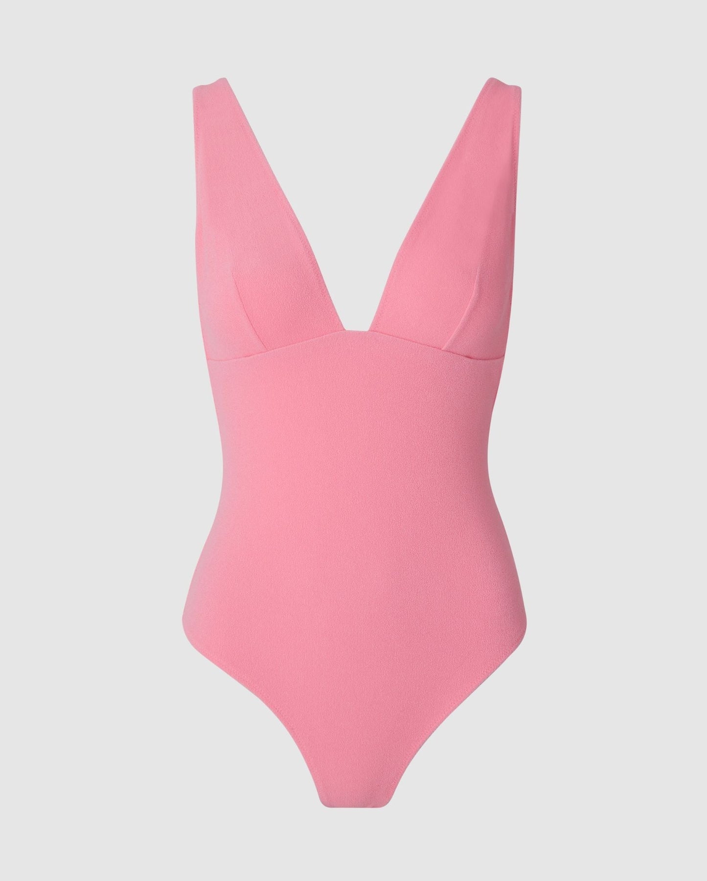 An plunge neck swimsuit in candy pink.