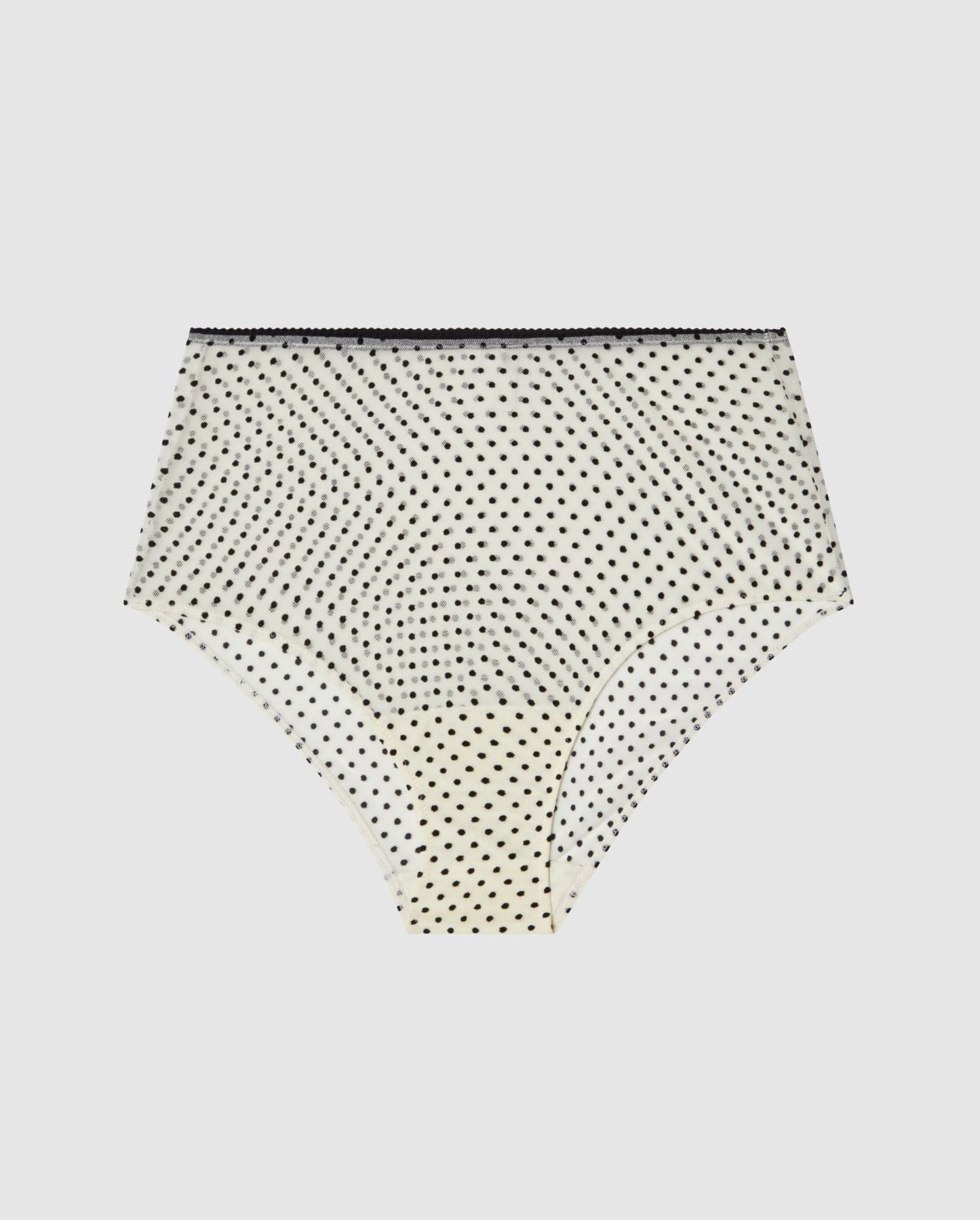 An High-waist Mesh Bikini brief with a cream and black dot design. 