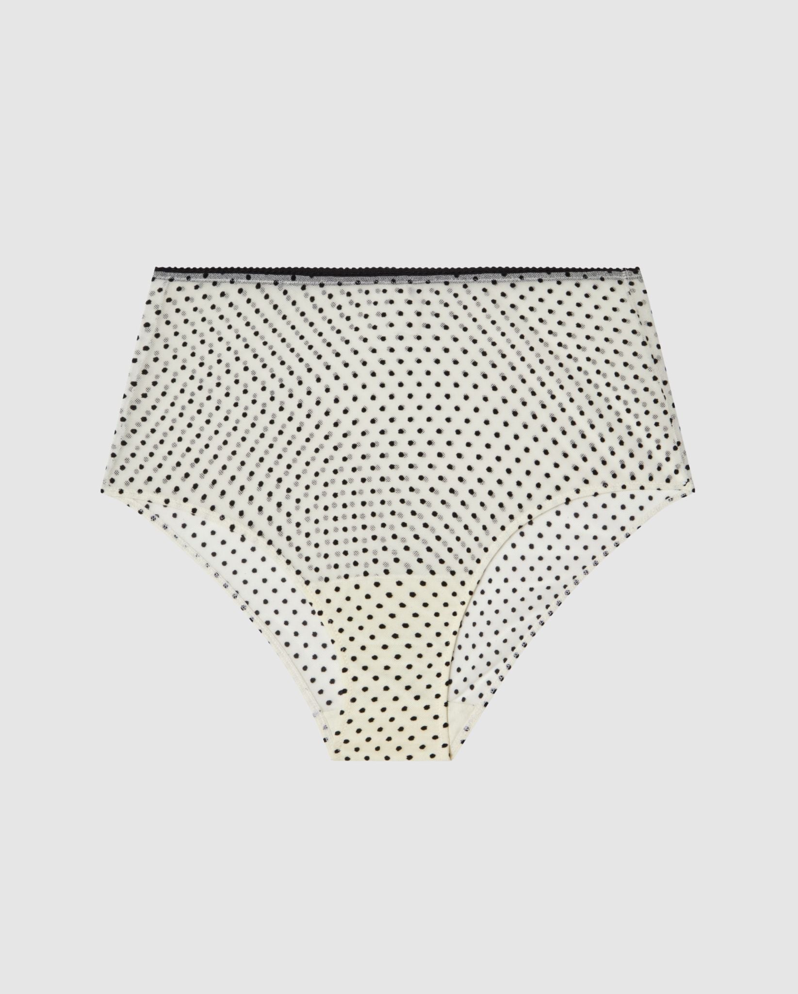 An High-waist Mesh Bikini brief with a cream and black dot design. 