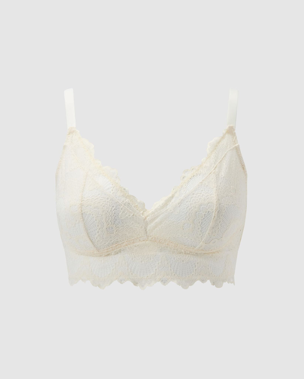 An lace Bralette in an cream color for larger cups with extra coverage and adjustable straps.