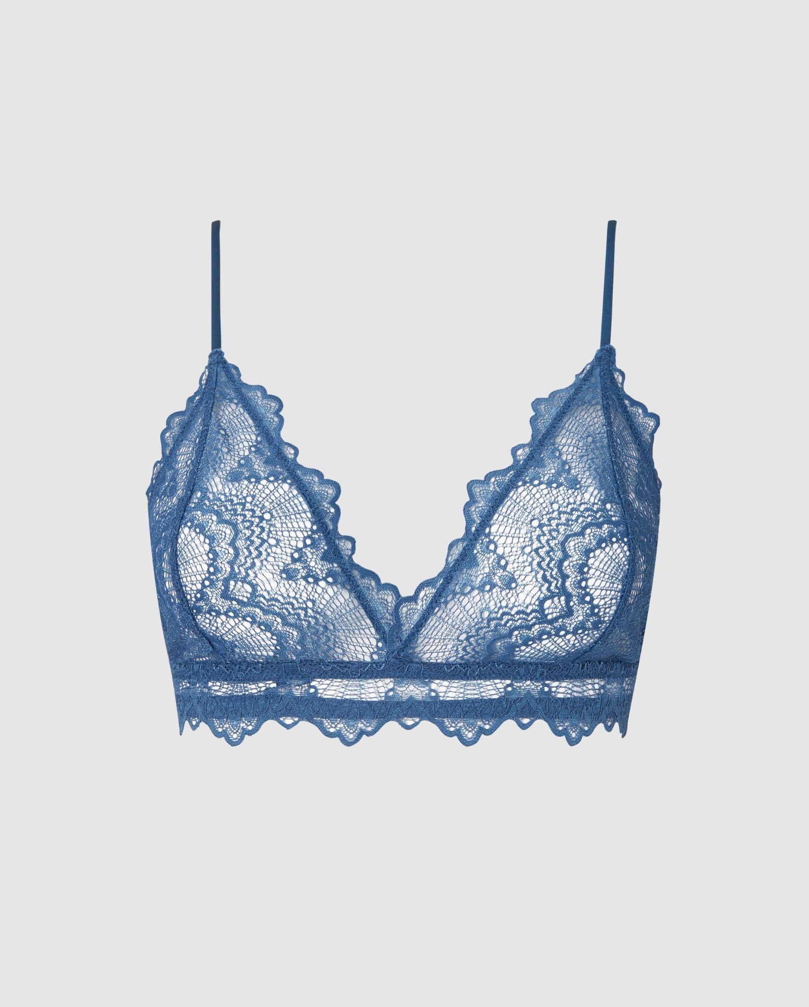 An lace triangle bralette in a faded blue color.