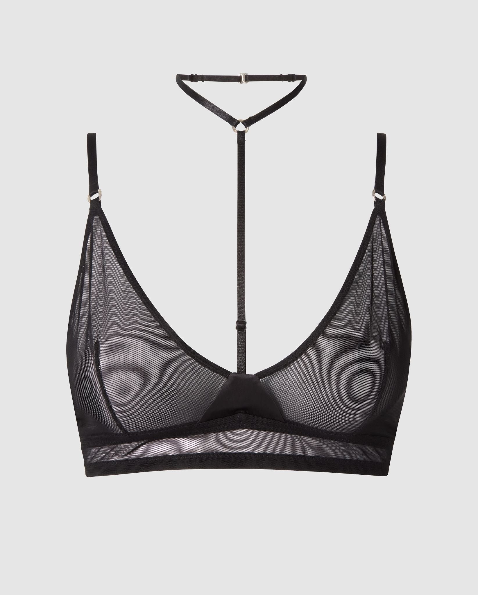 An black mesh triangle bralette with black accessories.