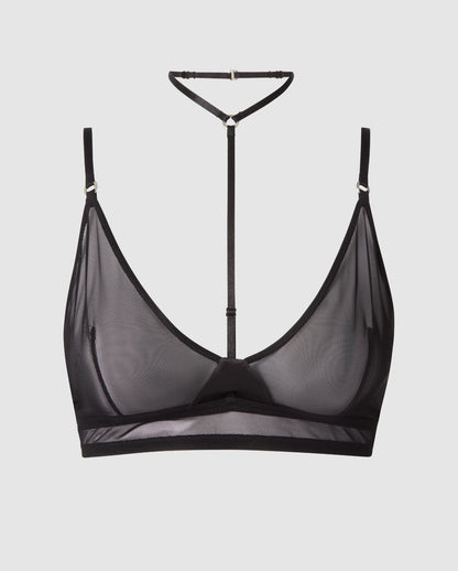An black mesh triangle bralette with black accessories.