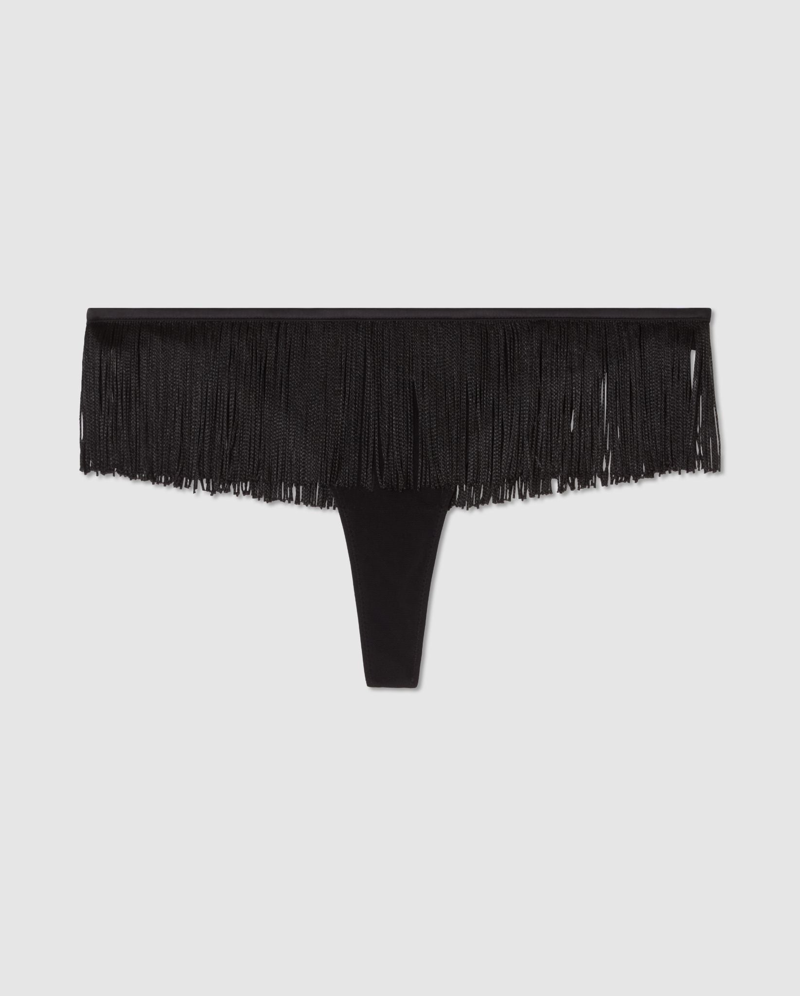 An interesting high cut pant in black with fringe accessories.