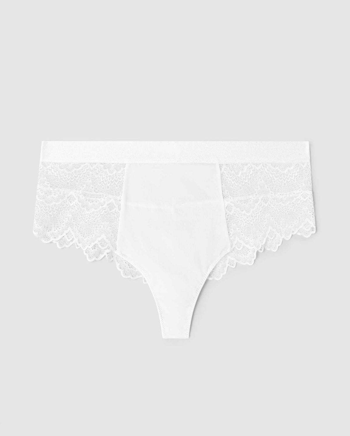 An highcut highwaist lace brief in white.